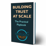 A book with the title "Building Trust at Scale"